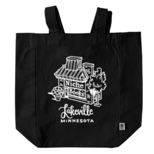 tote with Niche Books store illustration on it